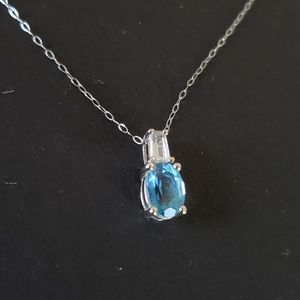 10k White Gold 4x3mm Baguette 7x5mm Oval Topaz 18" Necklace 1.0g